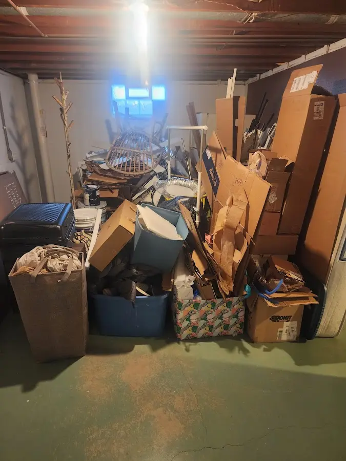 Roll-off dumpster container at job site for 15 Yard Dumpster Rental in Bremen